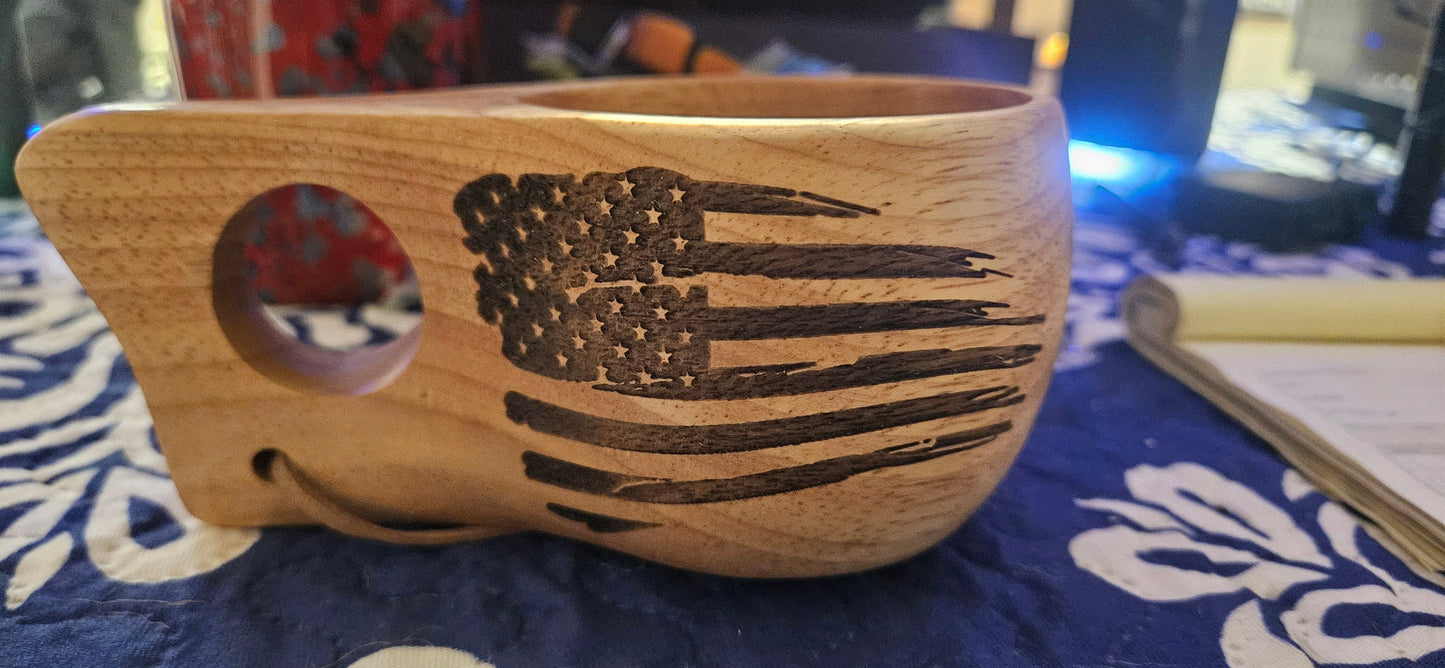 Laser engraved wooden whiskey cups.